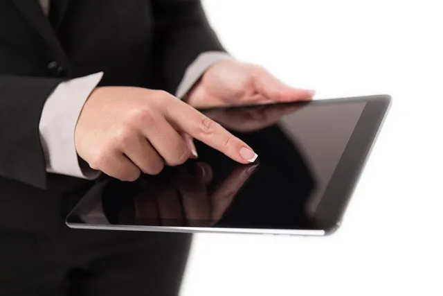 business woman, computer, occupation, working, adult, business, communication, corporate, digital, fashion, holding, internet. Where AI can help corporate communications without taking over the review