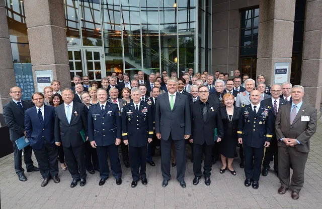 U.S. and German partners pose for a group photograph during the United States and Germany consultation meeting in Vaihingen, Germany, Sept. 3, 2014. Corporate communications and UK law: classify the message before applying a rule
